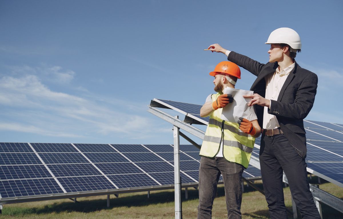 men in solar farm